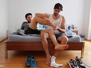 Gay friends playing with feet&comma; socks and shoes